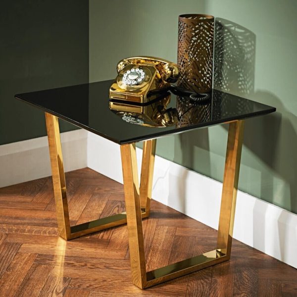 Antibes Lamp Table Sleek, black, high gloss top rests on gold openwork legs - Image 4